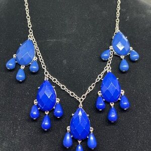 New blue tear drop necklace. 12” chain.